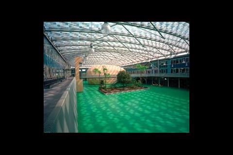The roofed-over courtyard creates a bright airy space which, with the addition of the first first floor walkways, now acts as the school's main circulation space. 
